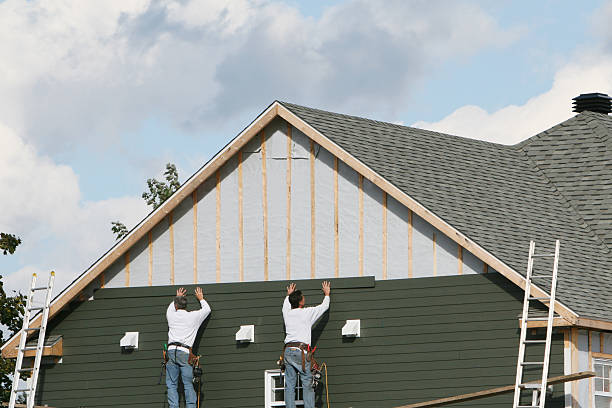 Professional Siding Replacement technician working in Conover, OH